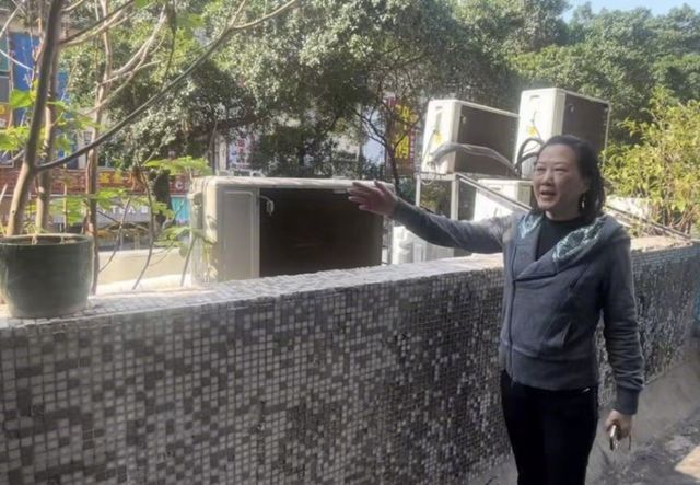 广州一居民家里太热一看发现：阳台外竟有12台空调外机！(图2)
